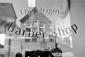 The Barbershop window sign on Friday Street, Minehead